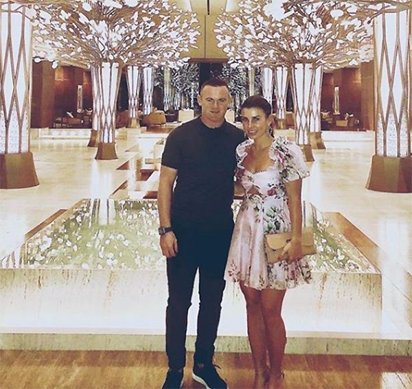 Coleen Rooney WOWS in the perfect date-night dress with husband