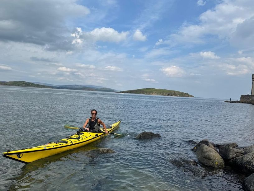 Helen Skelton in a yellow sea kayak