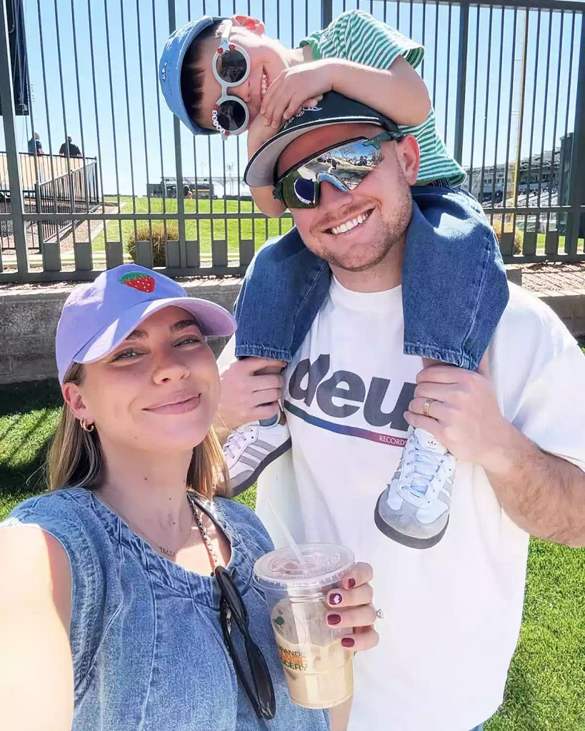 Emilie Kiser with husband Blake who has son Trigg on his shoulders