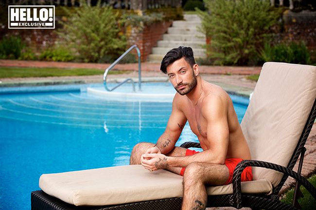 giovanni pernice red trunks poolside
