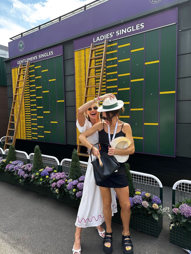 Vogue and Joanne in front of wimbledon leaderboard
