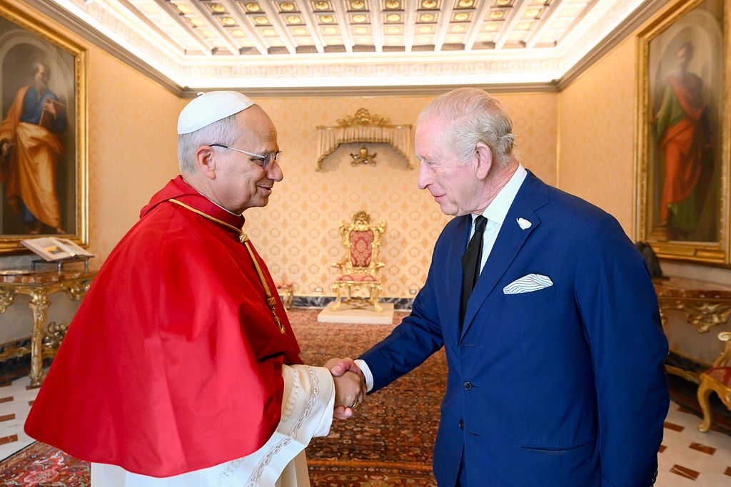 Pope Leo XVI shaking hand of King Charles at the Apostolic Palace