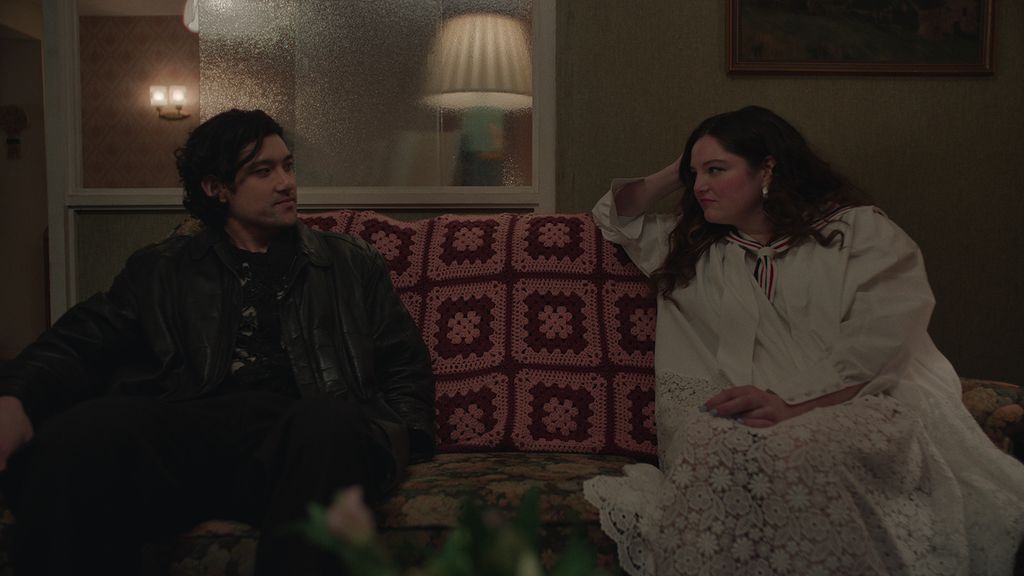 Man and woman on sofa