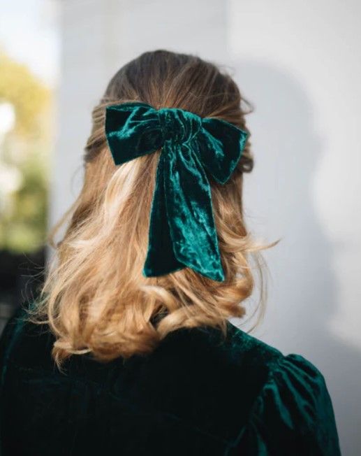 Princess Charlotte's bow is by Beulah London