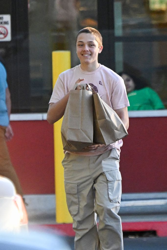 Knox Jolie Pitt is seen picking up groceries at a local market in Los Feliz