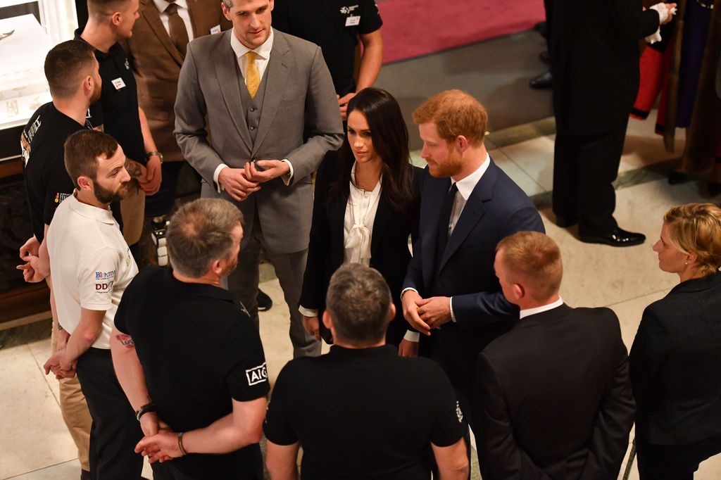 David Wiseman next to Meghan Markle and Prince Harry at the 'Endeavour Fund Awards' Ceremony at Goldsmiths Hall on February 1, 2018 
