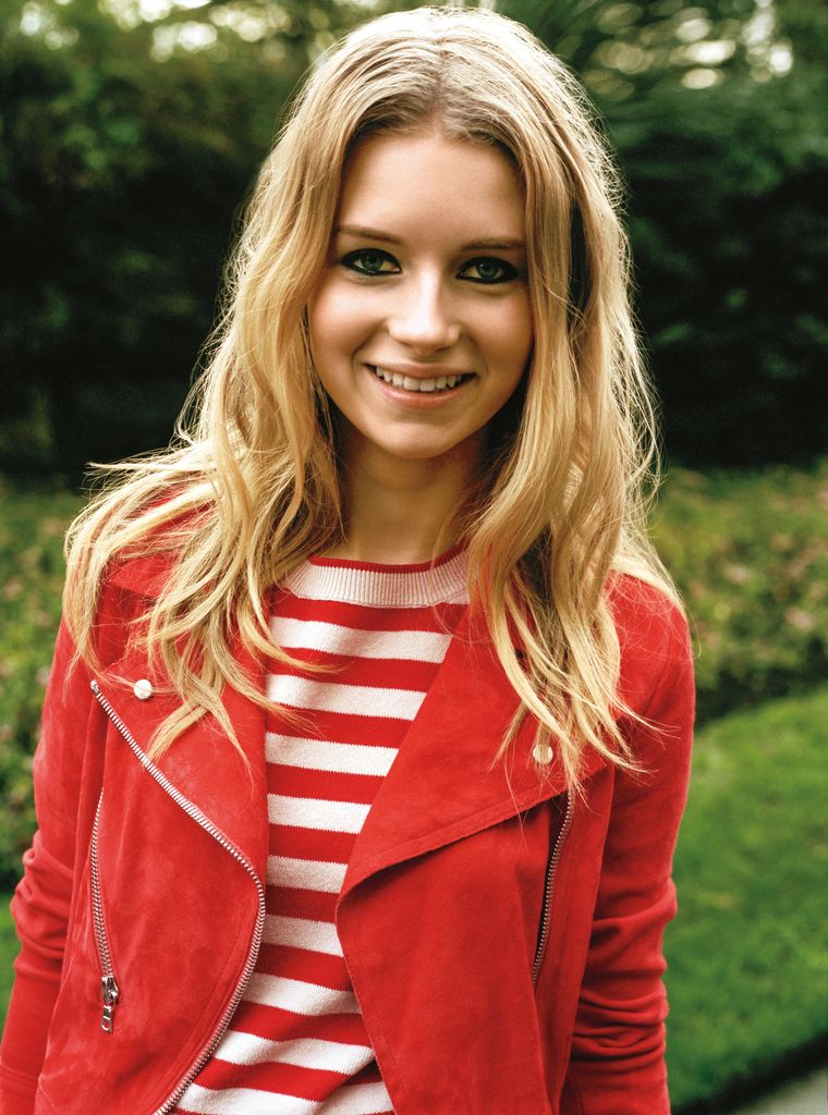 Lottie Moss in 2014 in a red striped top and red suede jacket