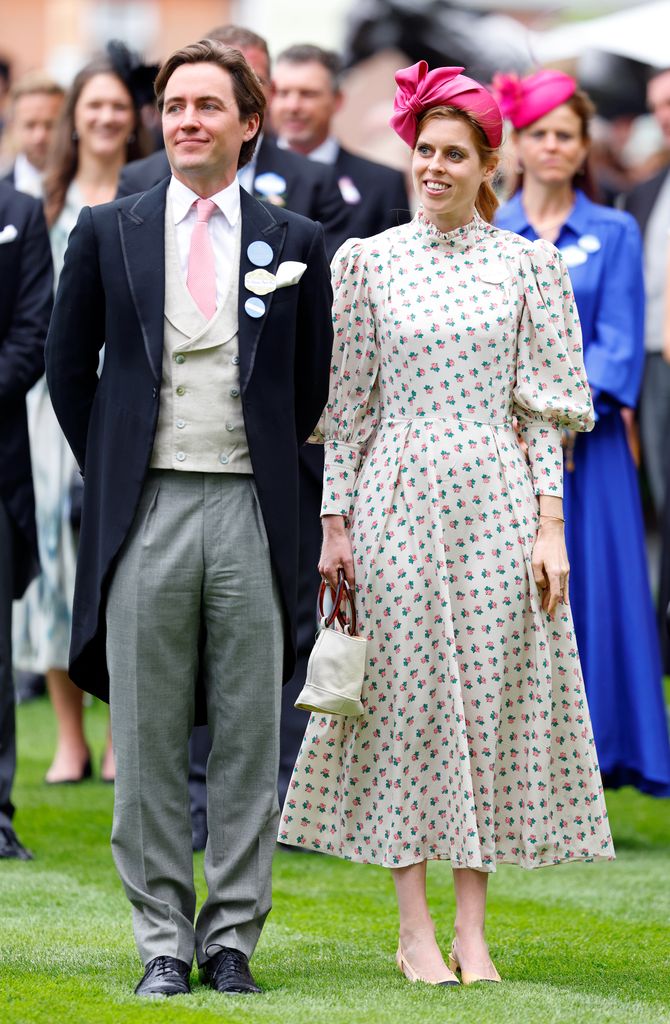 Princess Beatrice wearing a ditsy floral puff sleeve dress with a bright pink hat