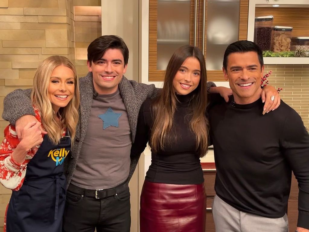 Kelly Ripa and Mark Consuelos with children Lola and Michael - who is his dad's double!