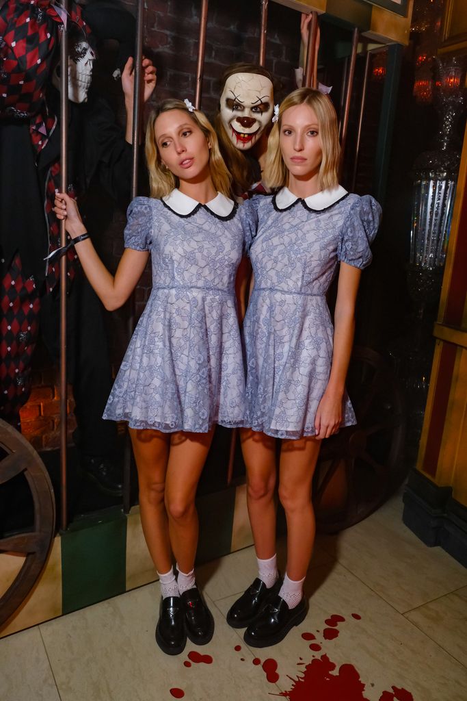 Princess Maria-Olympia of Greece and Denmark and Ella Richards dressed as the creepy twins from The Shining