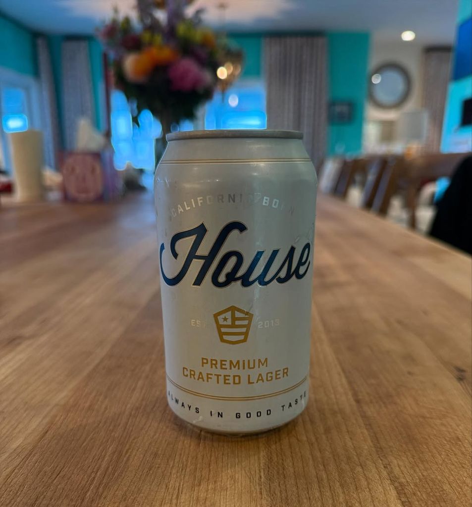 Carey Hart shares a photo of himself with a can of House Beer in his Santa Barbara living room on Instagram