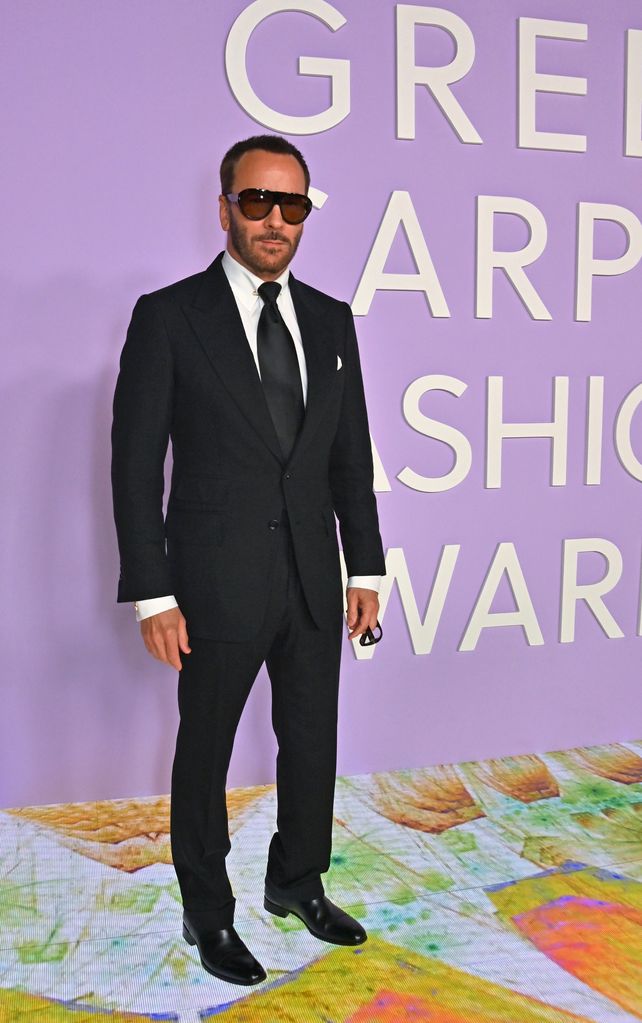 Tom Ford posing on the red carpet