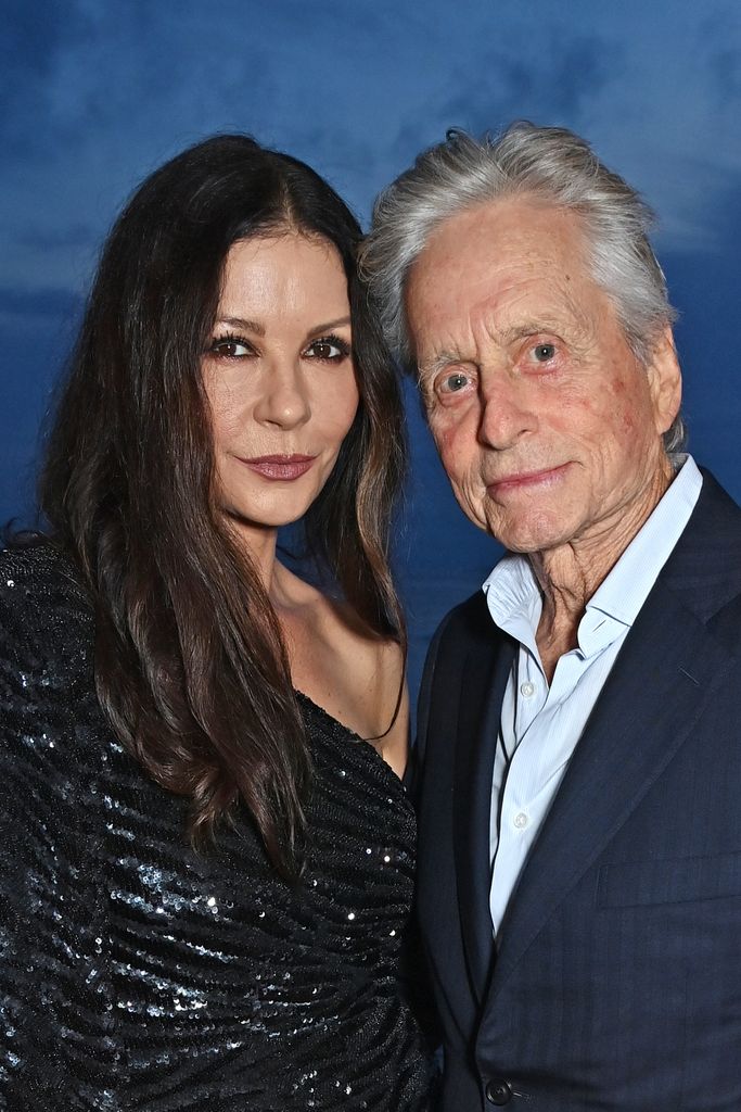 Catherine Zeta-Jones and Michael Douglas attend the launch of the new Aston Martin DB12 at the Hotel du Cap-Eden-Roc in Antibes on May 24, 2023 in Cannes, France