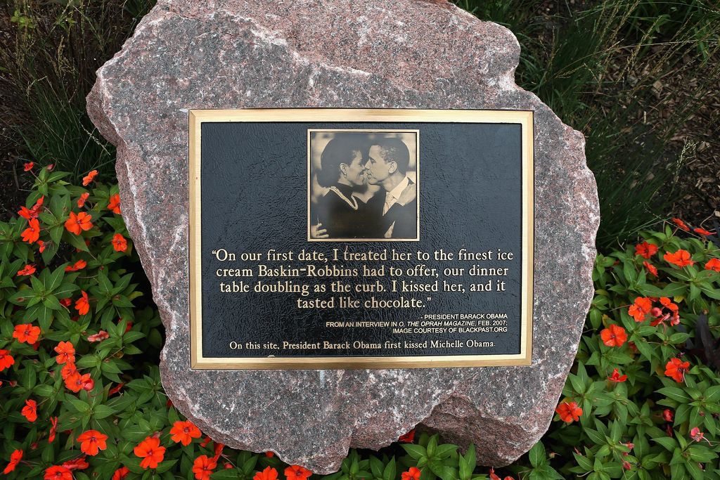 A plaque placed outside a strip mall in the Hyde Park neighborhood marks the location where President Barack Obama and first lady Michelle Obama shared their first kiss 