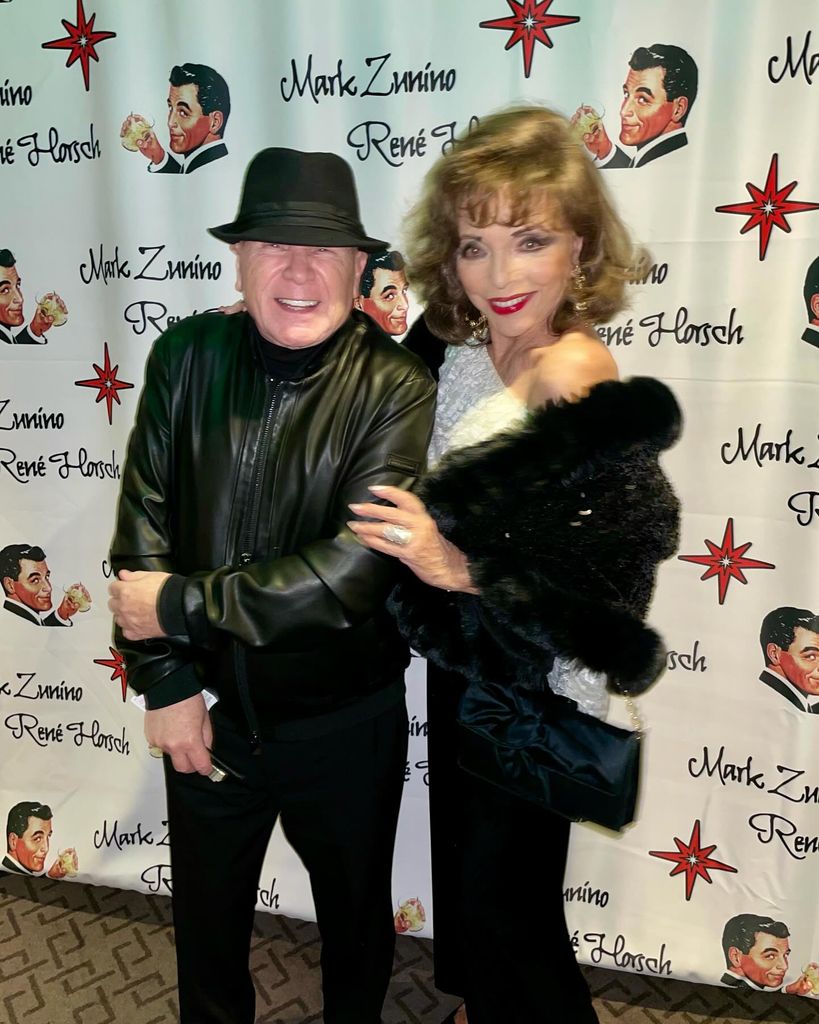 Joan was radiating charm as she wore a black fur jacket