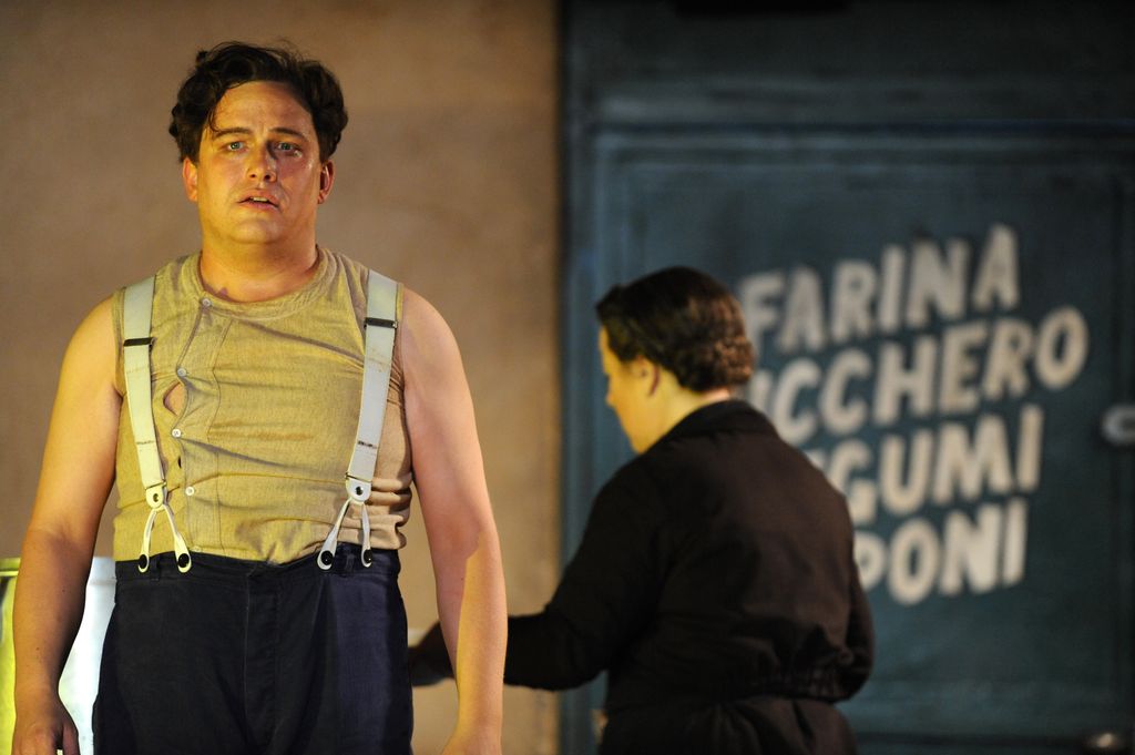 Peter Auty (as Turiddu) and Kathleen Wilkinson (as Lucia) perform in English National Opera's production of Mascagni's opera "Cavalleria Rusticana" directed by Richard Jones at the London Coliseum. (Photo by robbie jack/Corbis via Getty Images)