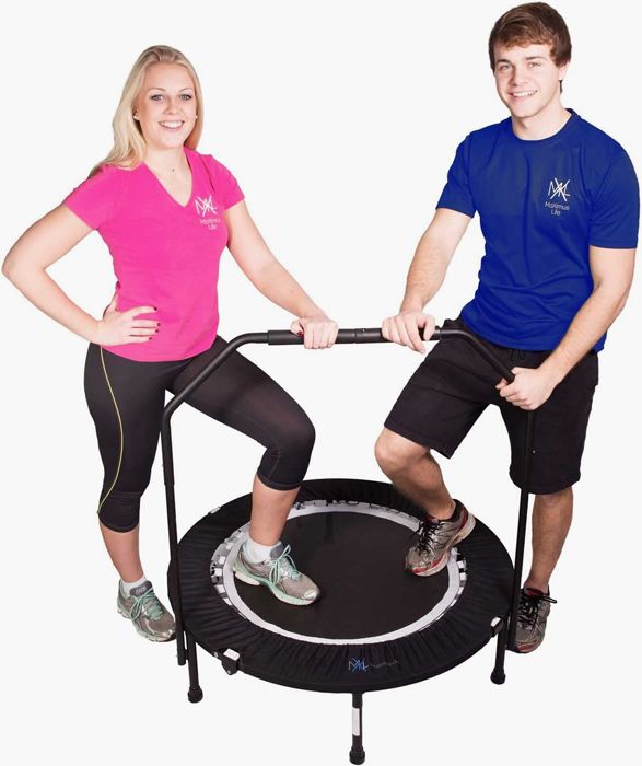 Photo of man and woman on a trampoline