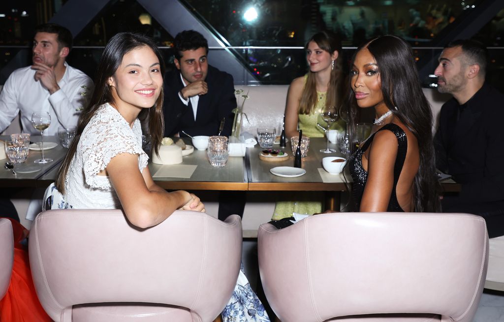 British tennis player Emma Raducanu and Naomi Campbell sit side by side