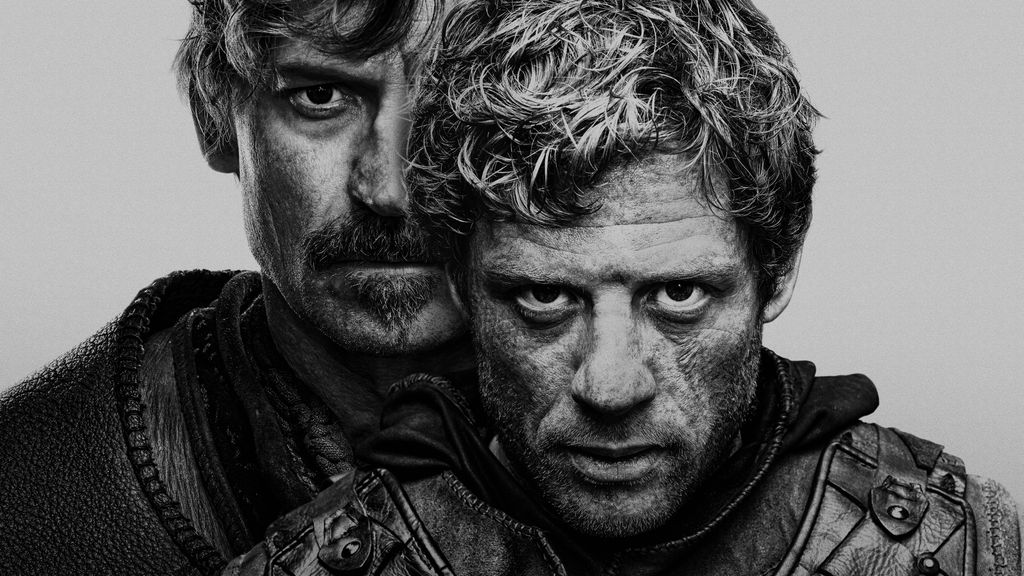 black and white photo of two men in armour