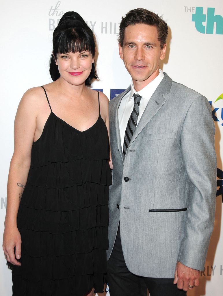 Brian Dietzen and Pauley Perrette pose on the red carpet in 2013