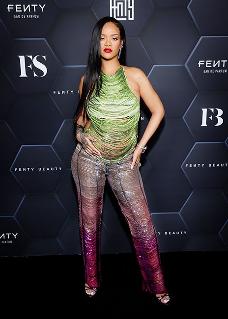 Rihanna poses at Fenty beauty event