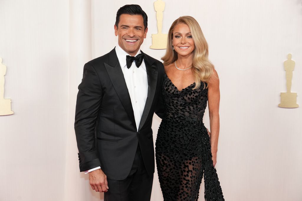 HOLLYWOOD, CALIFORNIA - MARCH 10: Mark Consuelos and Kelly Ripa attend the 96th Annual Academy Awards at Dolby Theatre on March 10, 2024 in Hollywood, California. (Photo by Jeff Kravitz/FilmMagic)