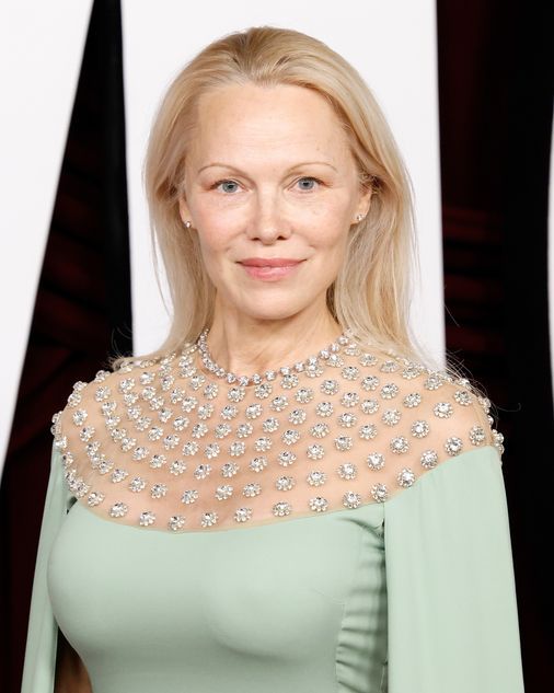 pamela anderson in turquoise dress