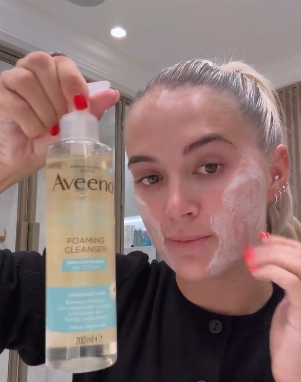 Molly-Mae using Aveeno