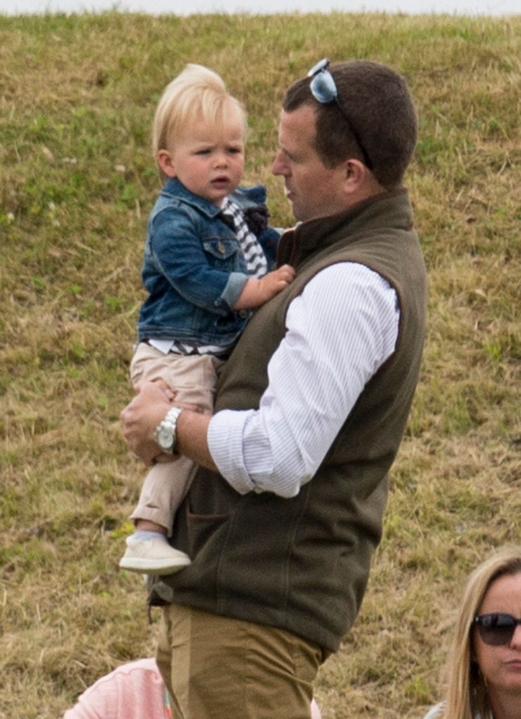 Peter Phillips holding baby Mia at Gigaset Charity Polo Match