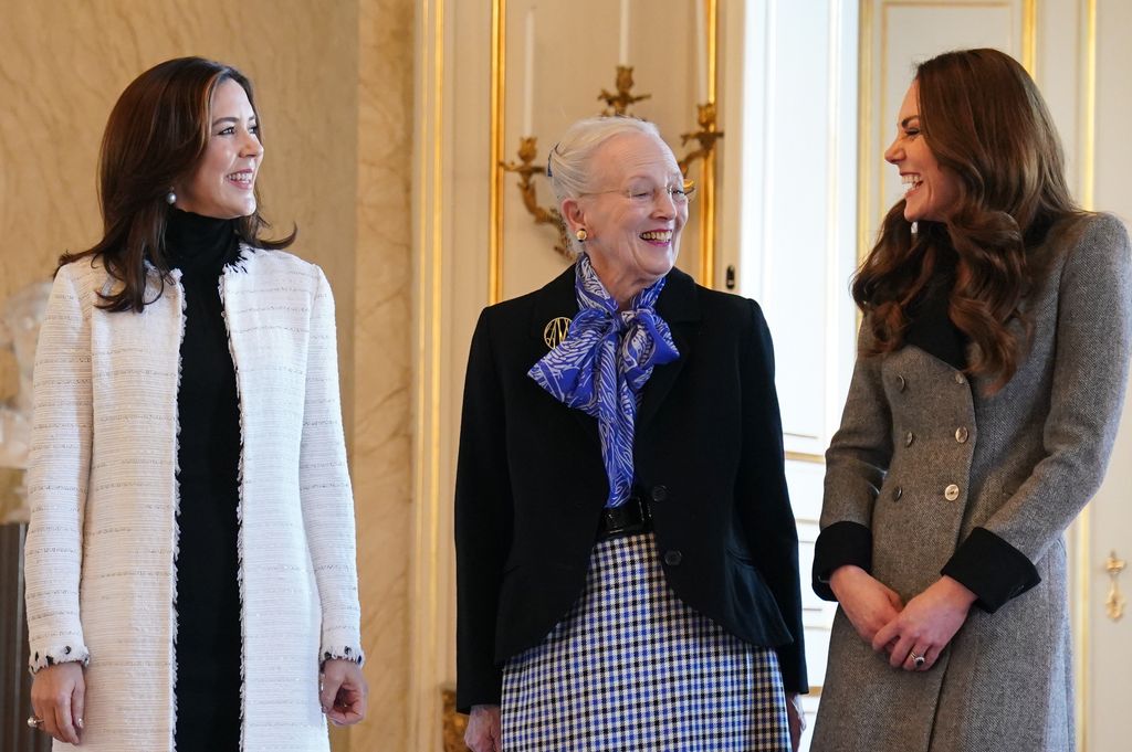 Kate Middleton laughs alongside Queen Margrethe and Crown Princess Mary of Denmark
