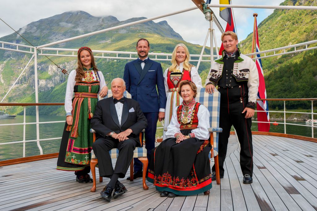 Norway's King Harald, Queen Sonja, Crown Prince Haakon, Crown Princess Mette-Marit, Princess Ingrid Alexandra, Prince Sverre Magnus pose for a group photo aboard the Royal Yacht ahead of the wedding