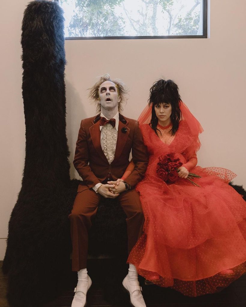 The duo dressed as Beetlejuice and Lydia Deetz