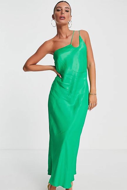 woman wearing green strappy cut out midi dress 