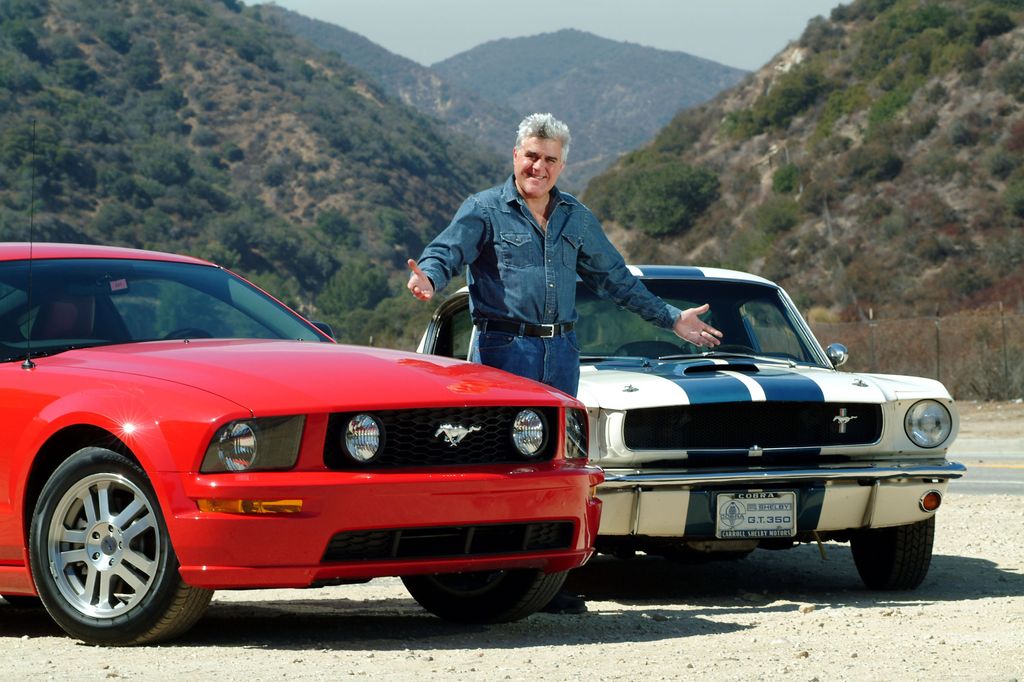 Jay Leno road tests a 2005 Shelby Mustang GT for a British newspaper. He compared the car with a classic Shelby Mustang he owns,  a 1965 Shelby Coupe GT. American Television personality Jay Leno who hosted the late night NBC "Tonight Show" collects cars. In 3 warehouses in a secure complex on the edge of Burbank airport he has over 100 cars, all insured, all in working order. The collection includes Bentleys, Bugatti's, McClaren, Cadillac, Hispano Suiza, Lamborghini, Morgans, Jaguars, there is also a collection of over 75 working motorcycles from the early 1920"s to a modern day Jet Bike July 24, 2004 Burbank, California