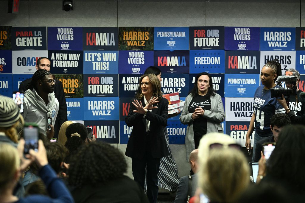 US Vice President and Democratic presidential candidate Kamala Harris visits a phone bank at the Democratic National Committee headquarters in Washington, DC