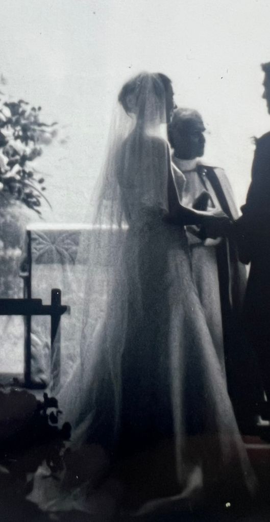 Black and white photo of a woman on her wedding day 