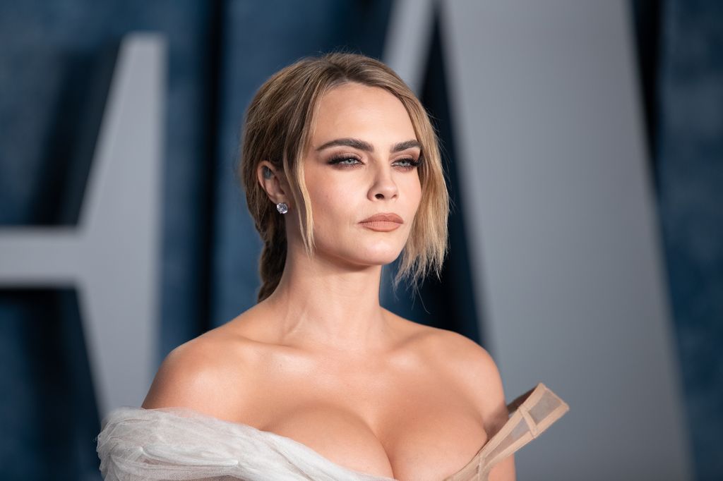 Cara Delevingne pouting at the Vanity Fair Oscar After Party