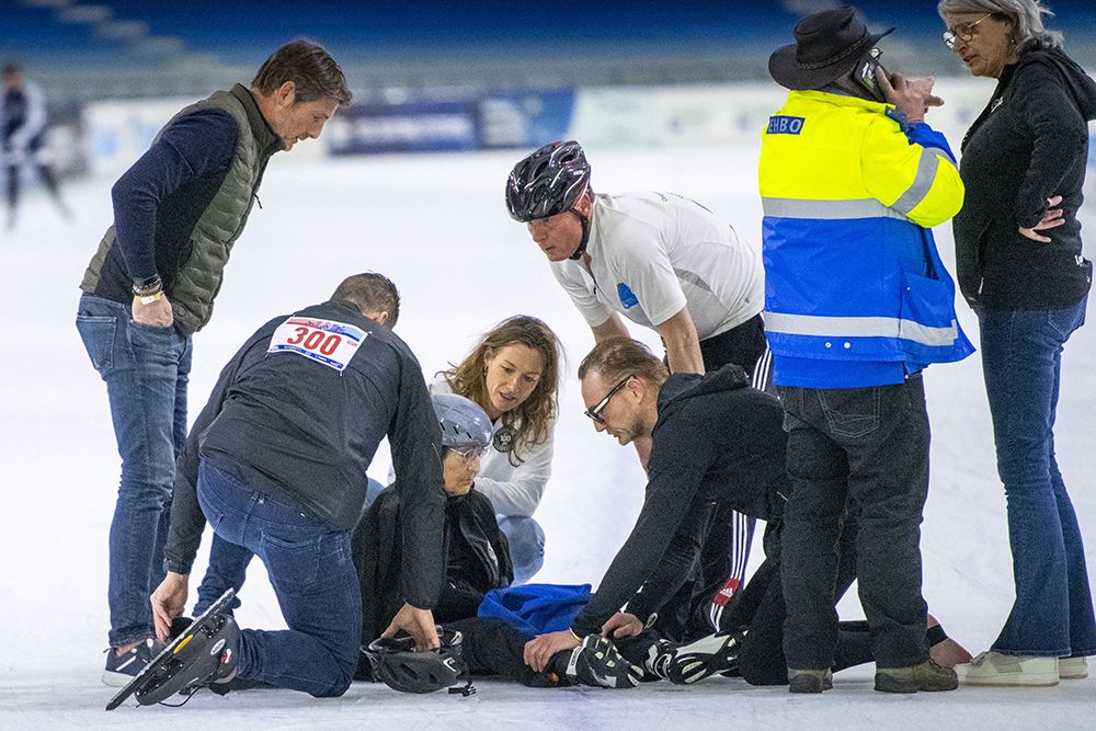 Princess Margriet sitting on the floor of the ice skating rink