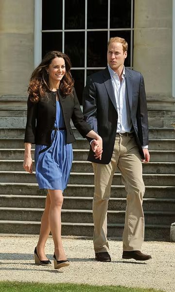 kate middleton prince william strolling the grounds of Buckingham Palace