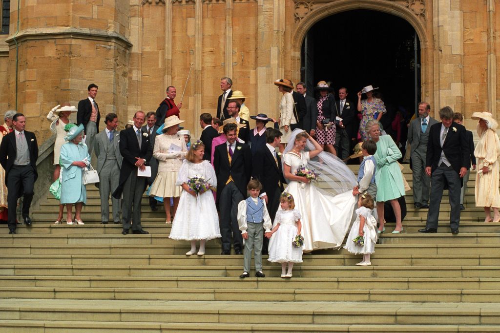 The Duchess of Kent (right of the bride) wore a mint green outfit by Giorgio Armani on her daughter Lady Helen Taylor's wedding day