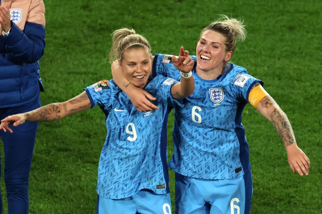 Rachel Daly and Millie Bright celebrating on pitch 