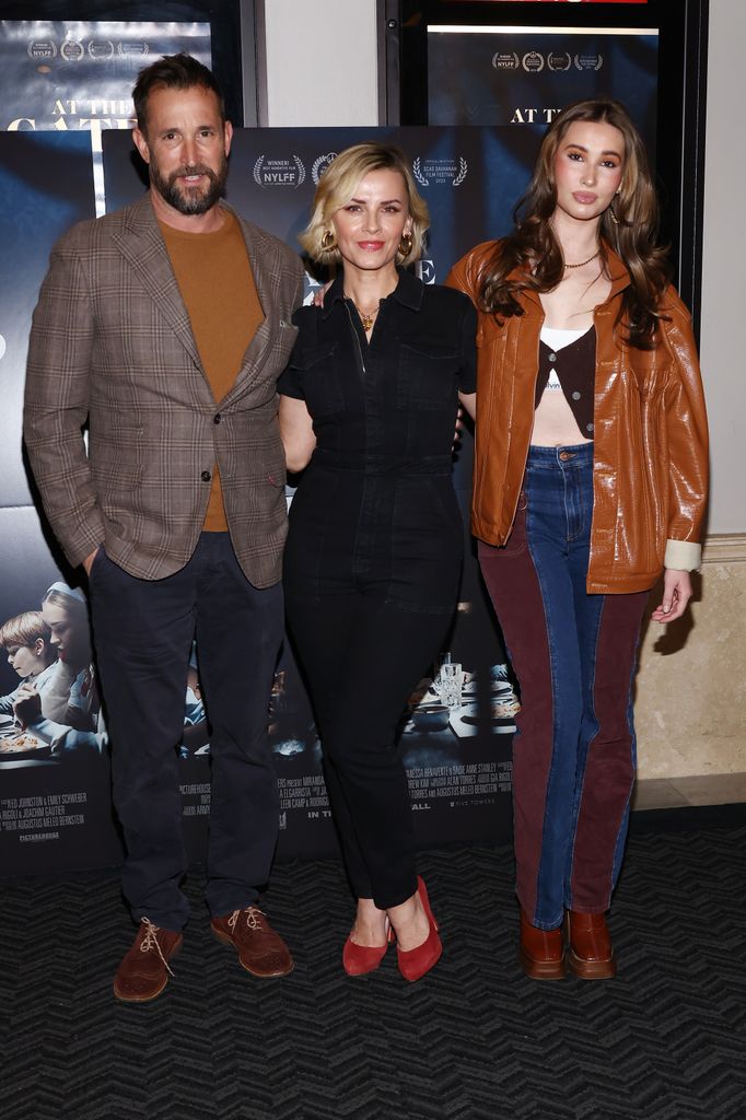 Noah Wyle, Sara Wells and Auden Wyle attend the "At The Gates" LA Special Screening - Picturehouse Will Open The Film On 11/3 In LA And On 11/10 In NY at AMC The Grove 14 on November 02, 2023 in Los Angeles, California