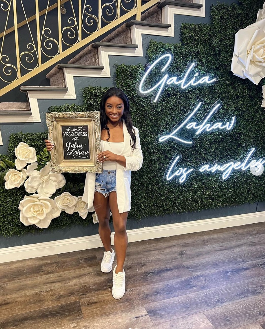 Simone Biles glows in thigh-split beaded dress for lavish bridal