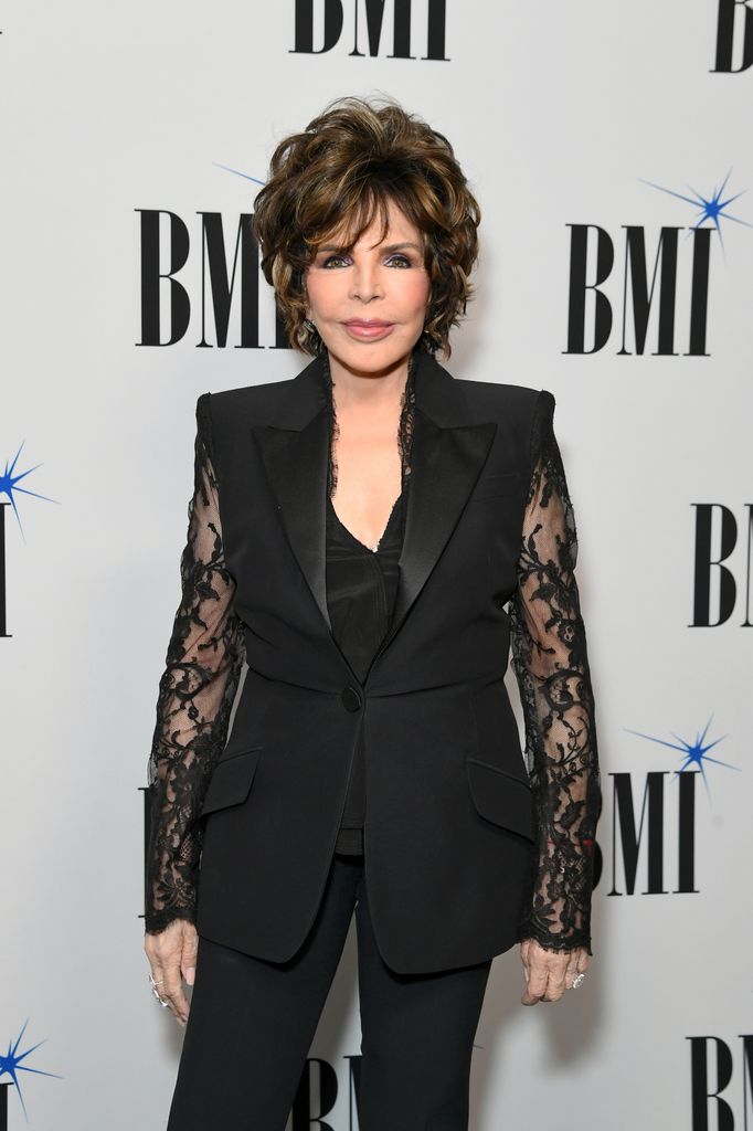 Carole Bayer Sager black outfit suit