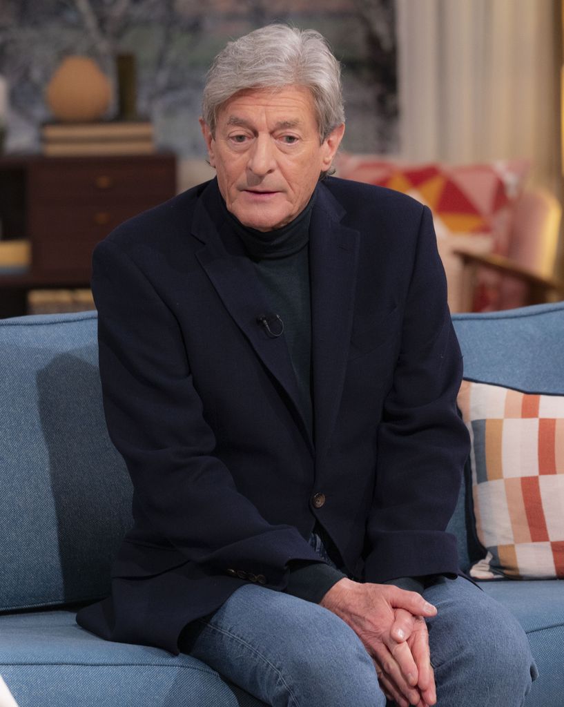 Nigel Havers looking downbeat in a black outfit