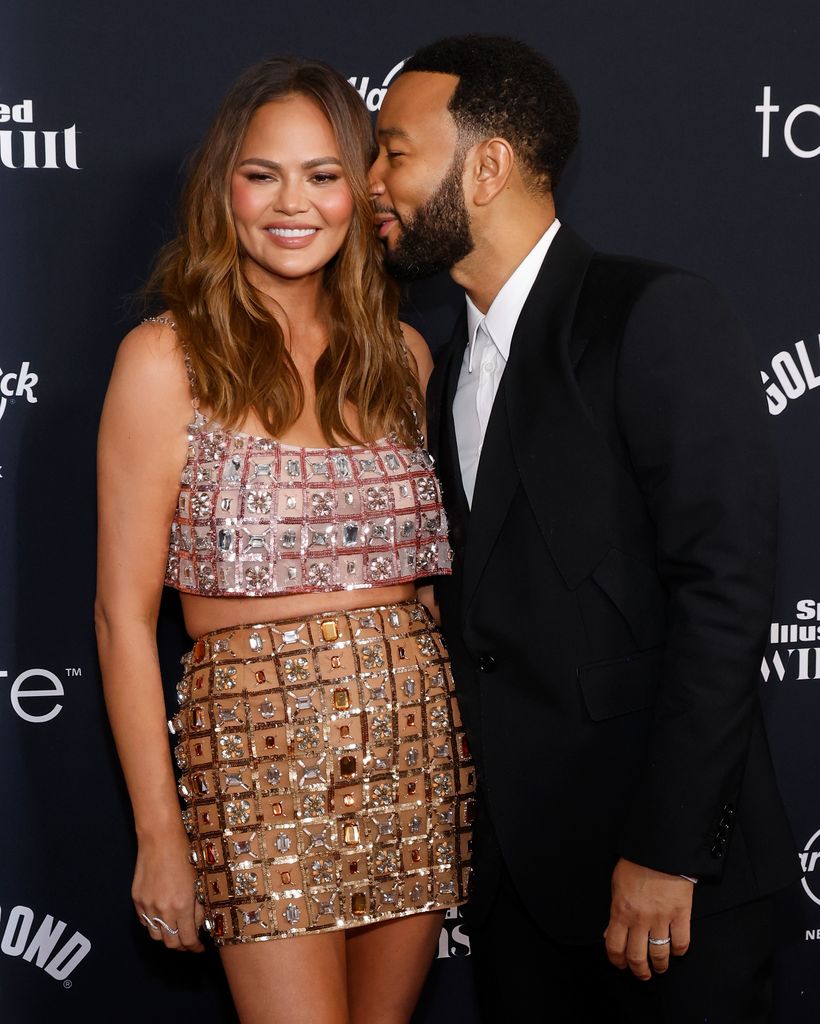 Chrissy Teigen and John Legend attend the 2024 Sports Illustrated Swimsuit Launch Party at Hard Rock Hotel on May 16, 2024 in New York City