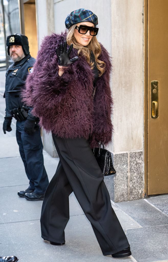 Jennifer Lopez arriving to Today show  in a fur purple coat