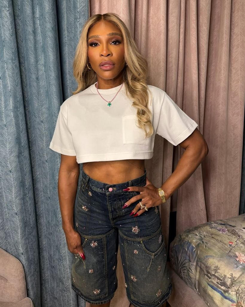 Serena Williams in white crop top and denim shorts