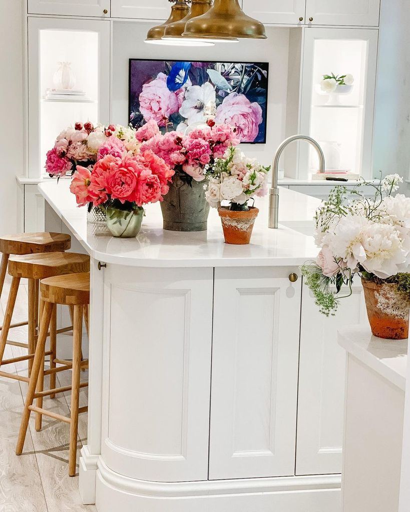 Shirlie Kemp's white kitchen with plants on the side