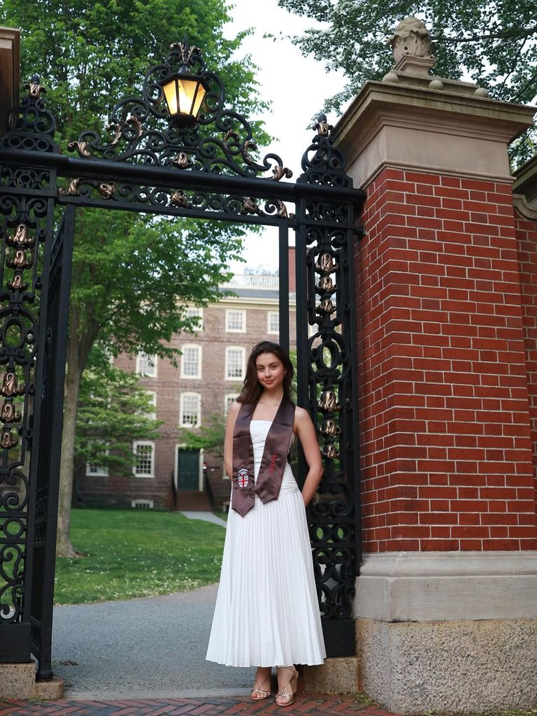 Carys Douglas poses for a photo outside Brown University during her graduation, shared on Instagram